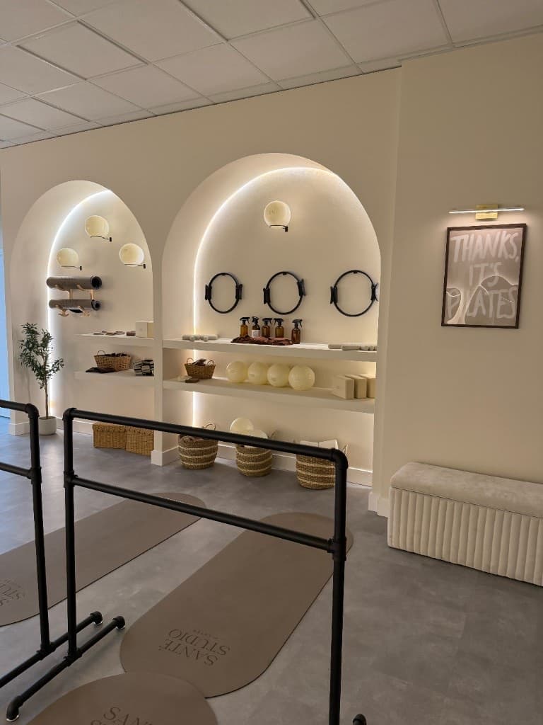 Lit alcoves with mats, props and barre at Santé Studio